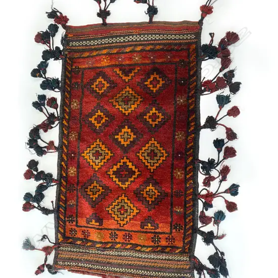Bag – wool, - flatweave/pile - red ground - stepped diamond repeat - sides and base tassled.108 x 60cm